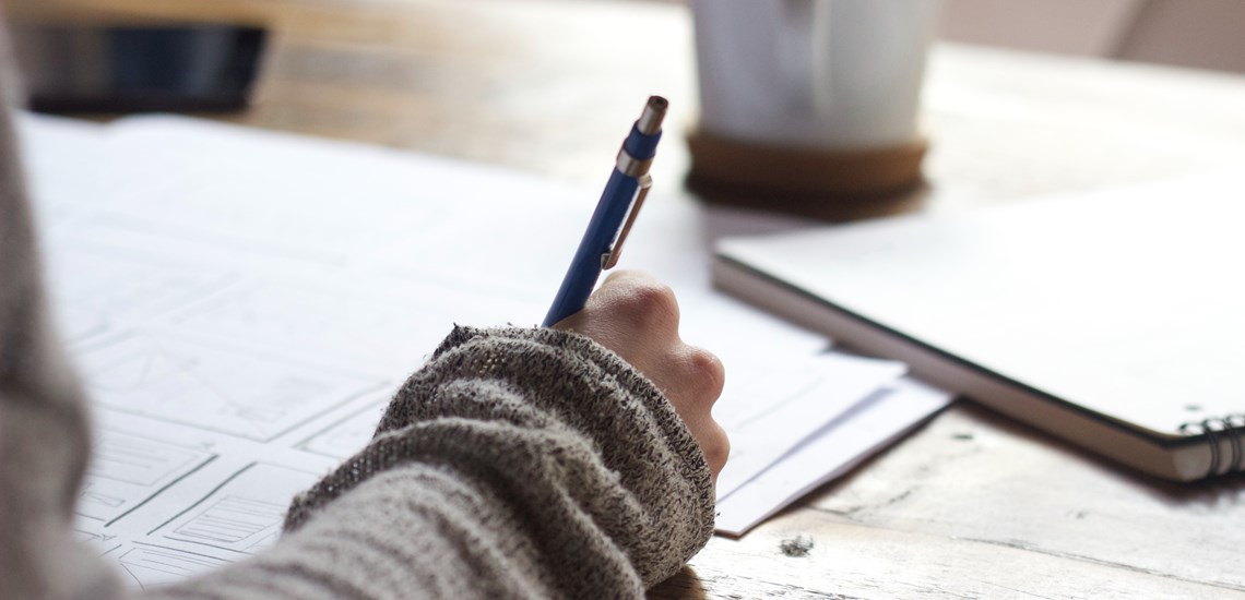 person-writing-will-paperwork
